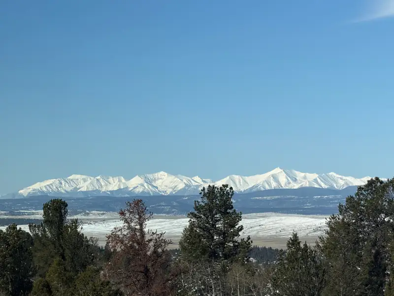 Snow-covered peaks above the valley in winter